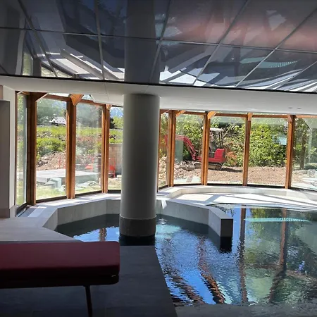 아파트 Tres Bel Avec Vue Exceptionnelle Et Piscine Interieure Dans La *